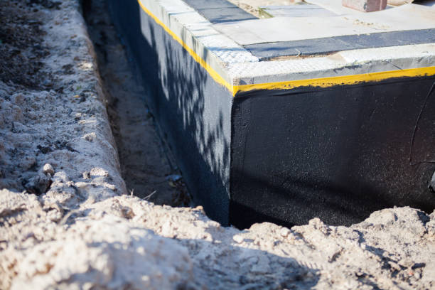 Professional Interior Drainage System technician working in Towanda, KS